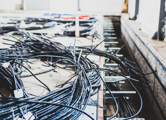 A large number of cables laid in the relay room