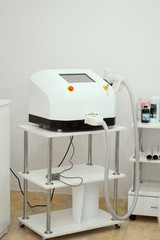 white cosmetology cabinet, close-up laser device, laser device, hair removal