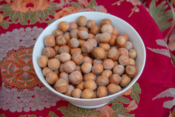 Food background. Hazelnuts texture. Top view . Hazelnut Nut Health Organic Brown Filbert Autumn Background Concept . Hazelnuts. Stack of hazelnuts.