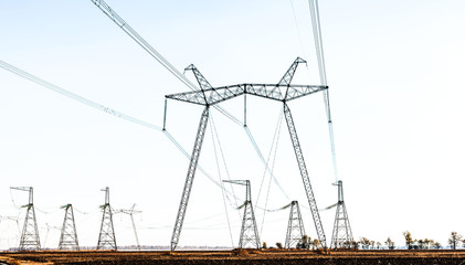 Power lines with metal supports