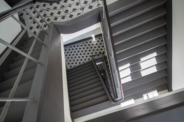 Grey staircase in modern building.