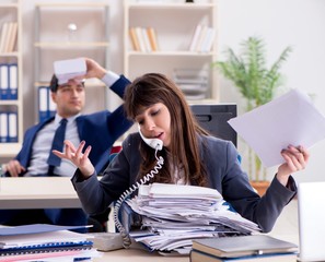 Employee with virtual reality glasses in office