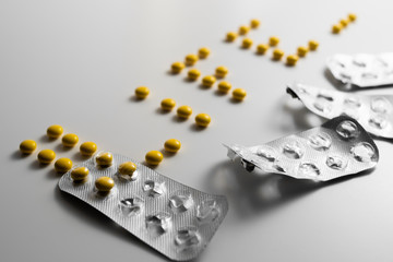  word is made of pills. life. around is used packaging from vitamin. on white background