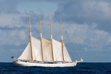 Fototapeta na wymiar Tall ship with sails at sea
