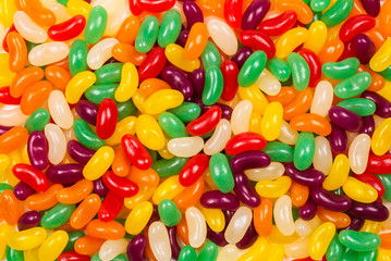 Colorful jelly beans isolated on white.