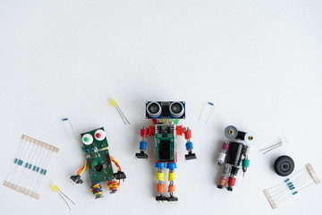 STEM school concept. A metal robot and an electronic board that can be programmed. Robotics and...