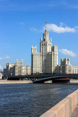 Fototapeta na wymiar Kotelnicheskaya Embankment Building (Stalinist skyscraper) view from opposite Moscow river bank