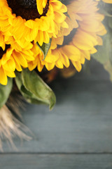 Autumn background with beautiful sunflowers, Top view.