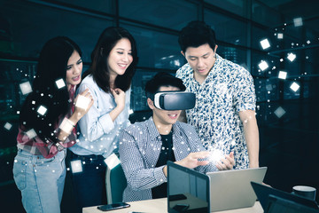 Young business people working with virtual screen