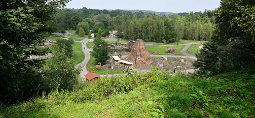 View of dinopark in valley in forest.