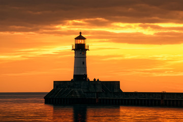 lighthouse at sunset - 296195367