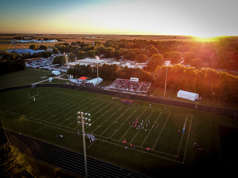 football game at sunset