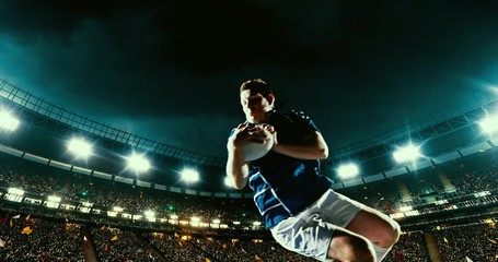 Professional rugby player jumps with a ball on a professional sports arena with bleaches full of people. Arena and people on it are made in 3D. - Powered by Adobe
