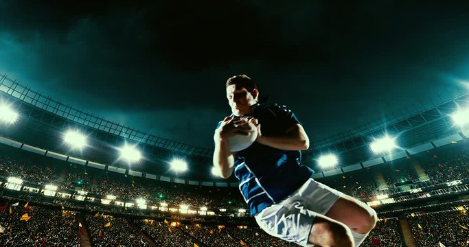 Professional rugby player jumps with a ball on a professional sports arena with bleaches full of people. Arena and people on it are made in 3D.