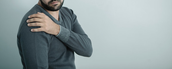 shoulder pain; medical concept, front view