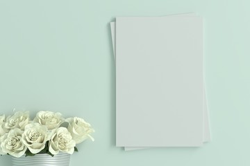 empty blank card with white rose in a mint green room