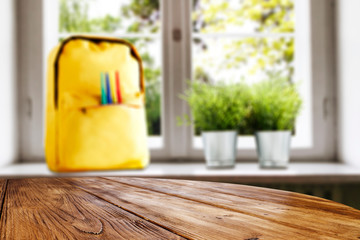 table background of free space and blurred window sill with schoolbag 