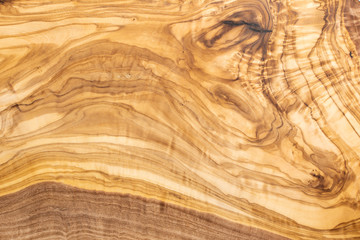 Beautiful olive wood texture background, top view
