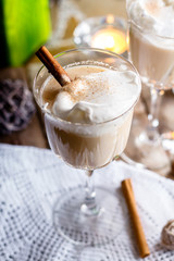 Top View of homemade Eggnog with cinnamon in cups