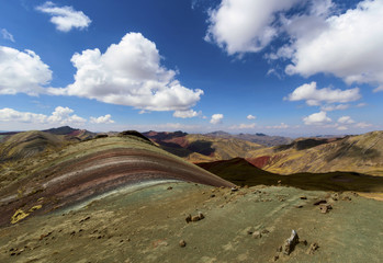 Stunning view at Palccoyo rainbow mountain (Vinicunca alternative), mineral colorful stripes in Andean valley, Cusco, Peru, South America