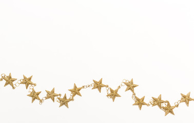 Gold star string on a white background