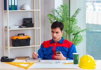 Foreman looking at construction plan