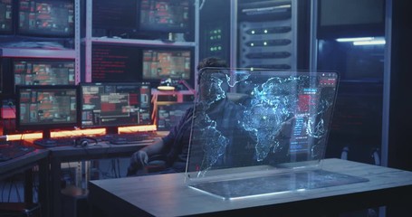 Hacker working with futuristic display screen - Powered by Adobe