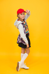 Cool schoolgirl. Have fun charismatic girl on yellow background. Tomboy concept. Teen age. Girl...