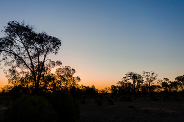 Naklejka na ściany i meble sunset in the outback
