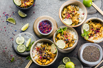 set of delicious traditional Asian food in bowls, top view 