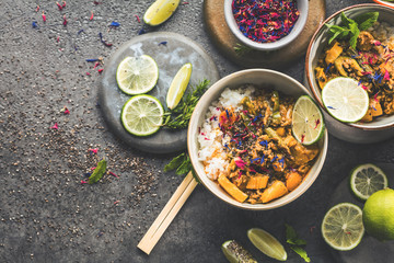 set of delicious traditional Asian food in bowls, top view 