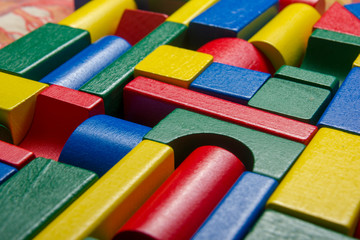 Kids educational developing toys frame on white background. Top view. Flat lay. Copy space for text