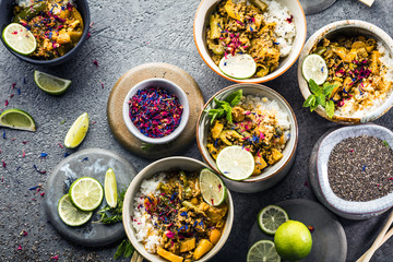 happy couple in aprons celebrating Christmas in the kitchen cooking christmas duck or Goose