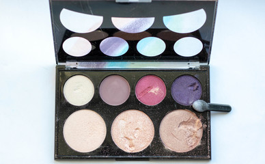 Cosmetics on a white background. Eye shadow palette