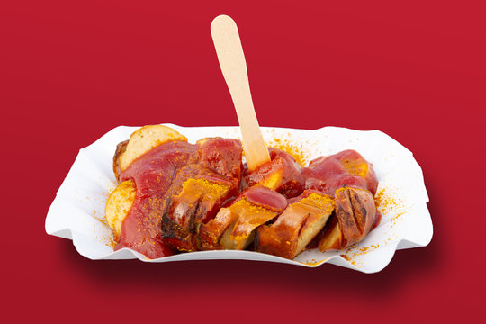 A popular specialty in Germany and Berlin is a grilled sausage with curry sauce. It is called Currywurst. A sliced sausage with ketchup and curry powder.