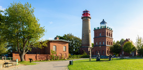 The lighthouses on the northern tip of the German island of Ruegen at Cape Arkona and some outbuildings. It is autumn and nice sunny weather.