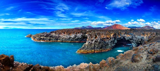 Foto auf Acrylglas Kanarische Inseln Beaches, cliffs and islands of Spain.Scenic landscape Los Hervideros lava's caves in Lanzarote island,landmark in Canary islands