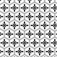 Seamless classic japanese pattern with floral and hexagonal motif on black and white colorway.
