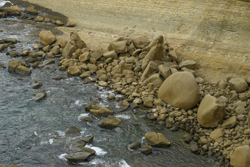 Texture of water and stone, top view. Ocean, sea