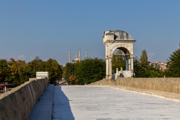 Fototapeta na wymiar Historical old Meric Bridge on Meric River. Edirne, Turkey 