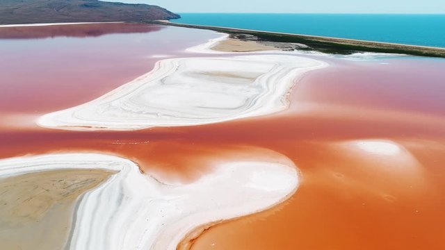 Beautiful aerial view of Laguna Colorada or Red Lake, a shallow salt lake in the southwest of the Altiplano of Bolivia. Shot. Eduardo Avaroa andean fauna National Reserve