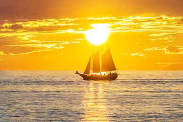 sailing boat at sunset