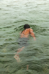 A Sama-badjao fisherman in his element. Manual fishing.