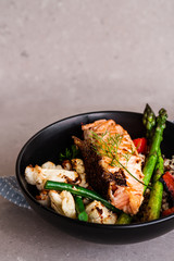 salmon fillet and vegetables