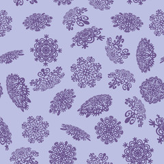 Vector illustration of a seamless pattern of winter and New Year theme. Various snowflakes are depicted on a light background. Can be used as gift paper and for various decor.