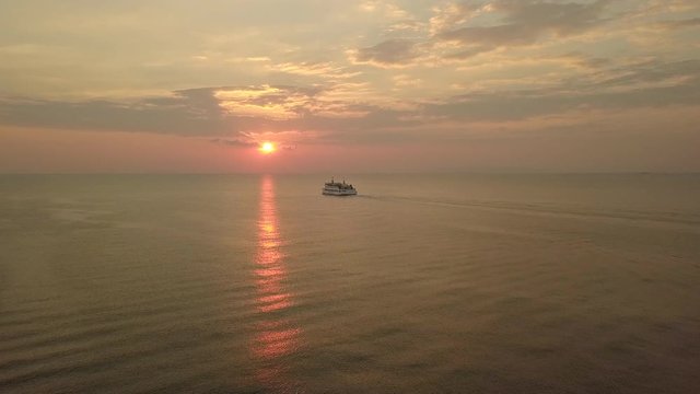 Ferry crusing the sea at Sunset -Drone scene - Koh Samui - Thailand