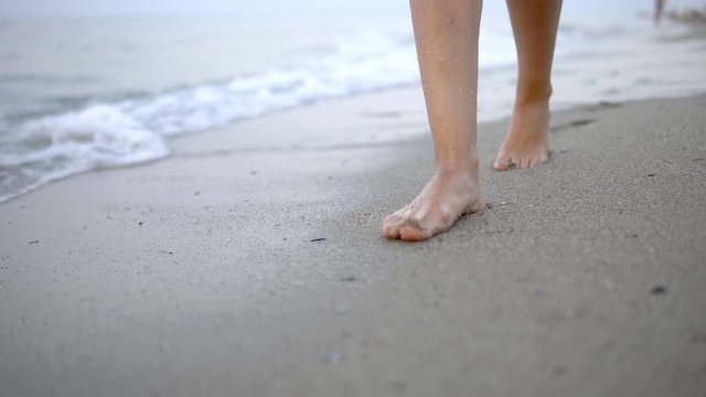 Woman walking on a beach