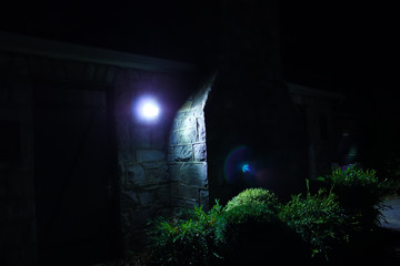 Fototapeta na wymiar Old mason building at night