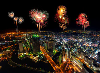 Fireworks over Yokohama cityscape at night, Japan