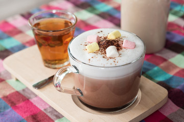 Hot chocolate with marshmallow and a cup of tea